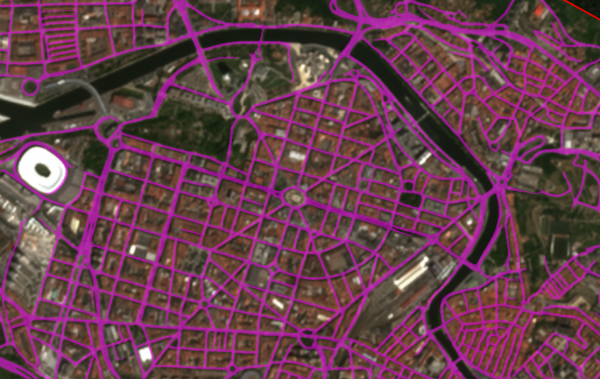Fotografía aérea de la ciudad de Bilbao con la segmentación de vías marcadas en color fucsia