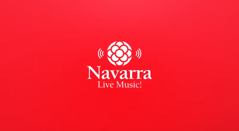Fotografía de la frase Navarra Live Music sobre un fondo rojo